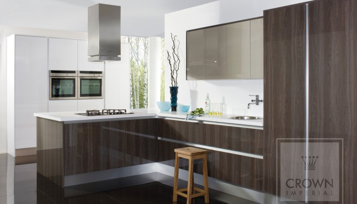 Image of kitchen interior using modern wood cabinetry with stainless steel and white accents