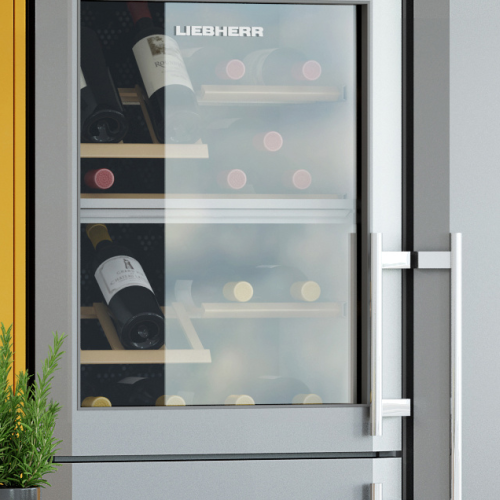 Image of refrigerator with in-built wine rack and bottles of wine