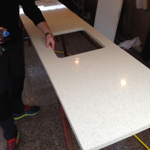 Image of cut quartz countertop before installation