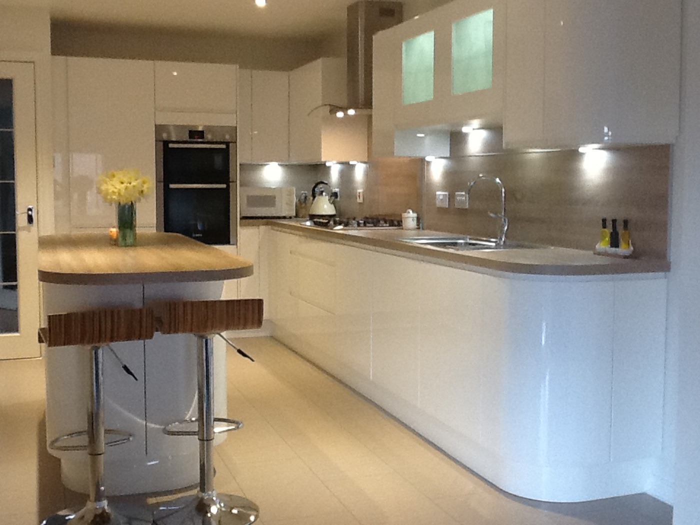 The finished handleless gloss kitchen